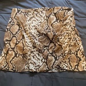 XL cheetah skirt. Never worn.